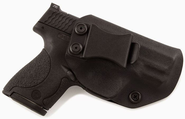Пистолет  Смит и Вессон (Smith & Wesson M&P) в кобуре фото